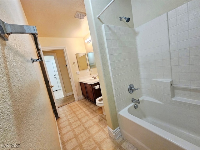 9462 Alhambra Valley St, Las Vegas, NV 89178 - full bathroom with vanity, bathing tub / shower combination, toilet, baseboards, and tile patterned floors