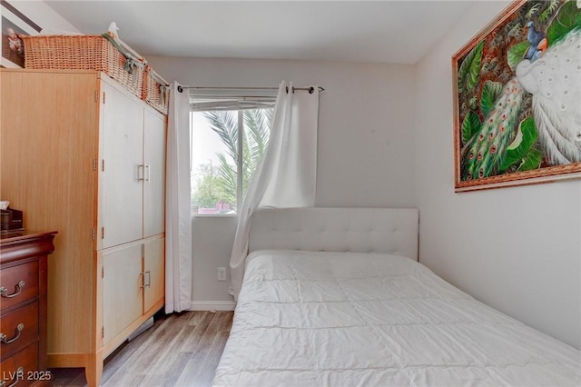 4739 Glenndavis Dr, Las Vegas, NV 89121 - bedroom featuring light wood-style flooring