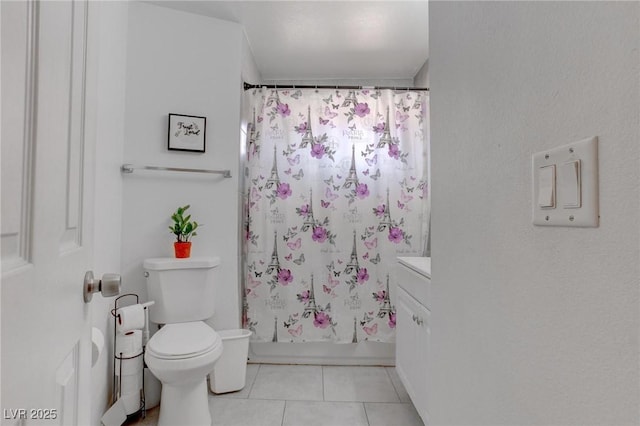 4739 Glenndavis Dr, Las Vegas, NV 89121 - bathroom featuring tile patterned floors, toilet, and shower / bath combo with shower curtain