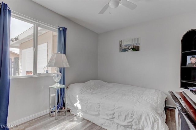 4739 Glenndavis Dr, Las Vegas, NV 89121 - bedroom with wood finished floors, baseboards, and ceiling fan