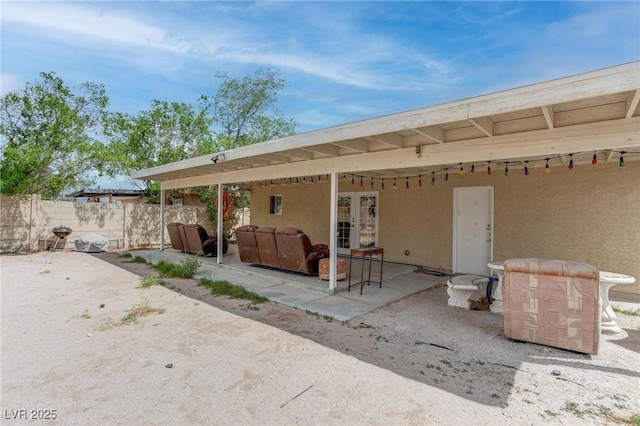 4739 Glenndavis Dr, Las Vegas, NV 89121 - rear view of property with a patio and stucco siding