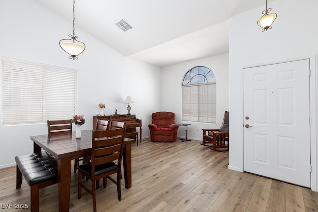 610 Playa Del Sol Way, Henderson, NV 89015 - dining room featuring light wood-type flooring, baseboards, and high vaulted ceiling