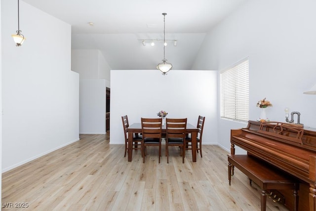 610 Playa Del Sol Way, Henderson, NV 89015 - dining room featuring wood finished floors, high vaulted ceiling, and baseboards