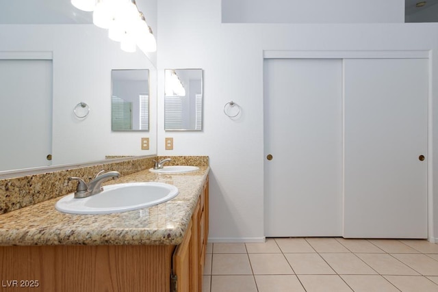 610 Playa Del Sol Way, Henderson, NV 89015 - bathroom with double vanity, tile patterned flooring, and baseboards