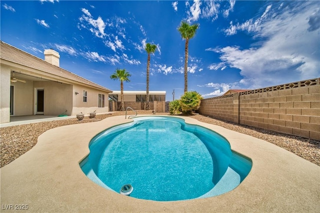 2851 Winchester Ave, Pahrump, NV 89048 - view of swimming pool featuring a fenced backyard and a patio area
