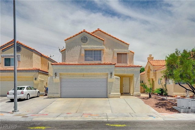 420 Clifton Heights Dr, Las Vegas, NV 89145 - mediterranean / spanish house featuring a garage, a tiled roof, stucco siding, and driveway