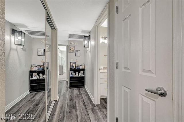 2451 N Rainbow Blvd Unit 2076, Las Vegas, NV 89108 - corridor with wood finished floors and baseboards