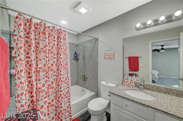 2451 N Rainbow Blvd Unit 2076, Las Vegas, NV 89108 - full bath with ensuite bathroom, shower / tub combo with curtain, vanity, toilet, and a ceiling fan
