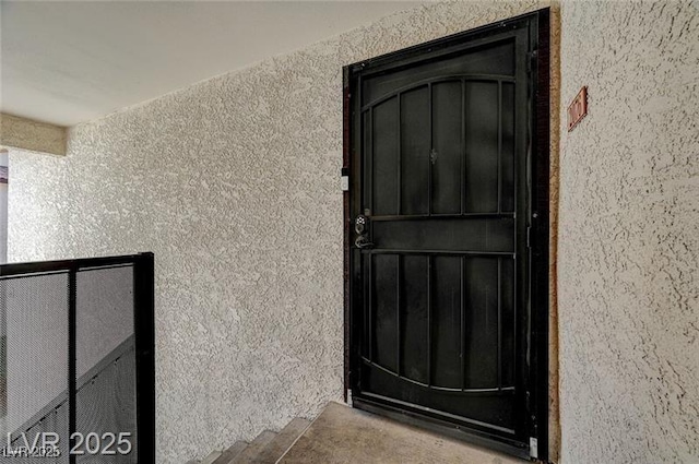 2451 N Rainbow Blvd Unit 2076, Las Vegas, NV 89108 - view of exterior entry with stucco siding