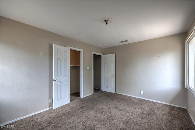 240 N 19th St, Las Vegas, NV 89101 - unfurnished bedroom with carpet floors and baseboards