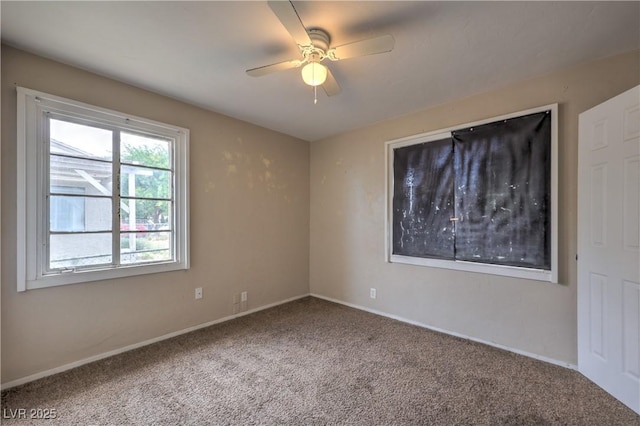 240 N 19th St, Las Vegas, NV 89101 - carpeted spare room with ceiling fan and baseboards