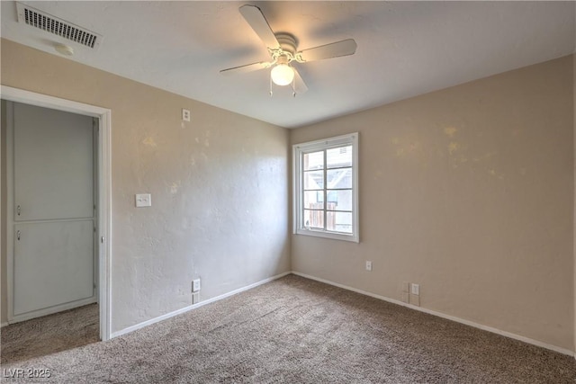 240 N 19th St, Las Vegas, NV 89101 - spare room featuring carpet flooring, baseboards, and ceiling fan