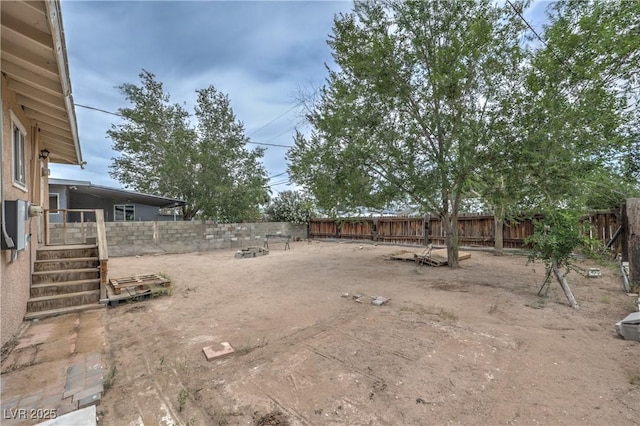 240 N 19th St, Las Vegas, NV 89101 - fenced backyard with an outdoor fire pit