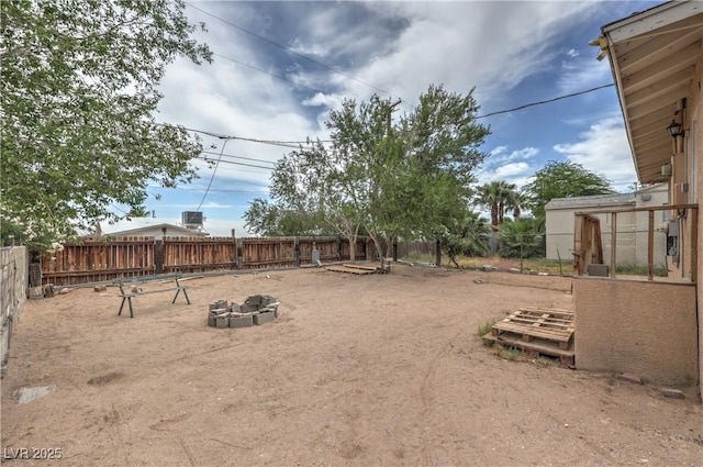 240 N 19th St, Las Vegas, NV 89101 - fenced backyard with an outdoor fire pit