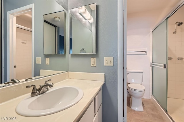 4718 Nara Vista Way Unit 104, Las Vegas, NV 89103 - full bath with tile patterned flooring, a stall shower, toilet, and vanity
