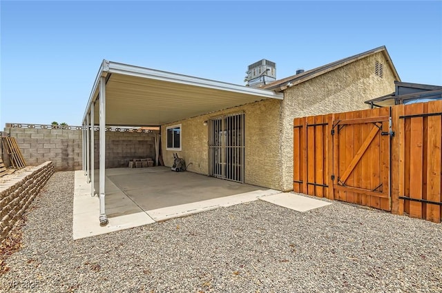 4611 Four Leaf Clover Dr, Las Vegas, NV 89122 - fenced backyard featuring a patio and a gate