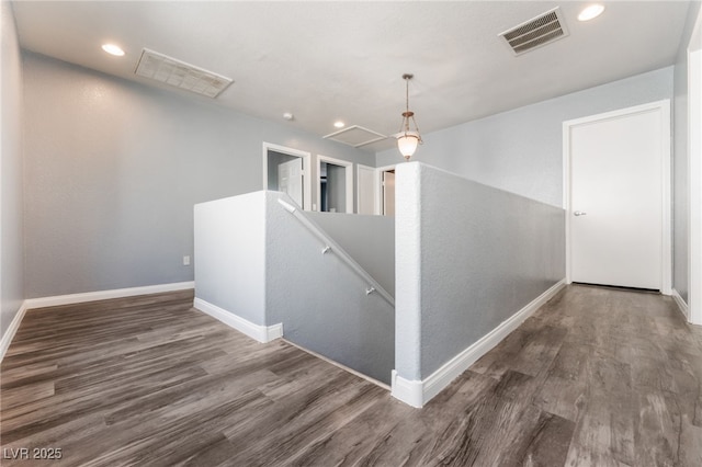 28 Yellow Flame Ave, North Las Vegas, NV 89084 - hall featuring an upstairs landing, wood finished floors, baseboards, and recessed lighting
