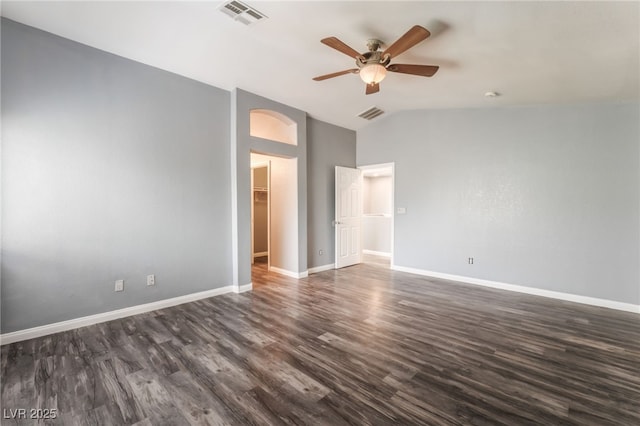 28 Yellow Flame Ave, North Las Vegas, NV 89084 - unfurnished bedroom featuring lofted ceiling, dark wood finished floors, baseboards, a spacious closet, and a ceiling fan
