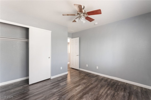 28 Yellow Flame Ave, North Las Vegas, NV 89084 - unfurnished bedroom with dark wood-style flooring, baseboards, a closet, and ceiling fan
