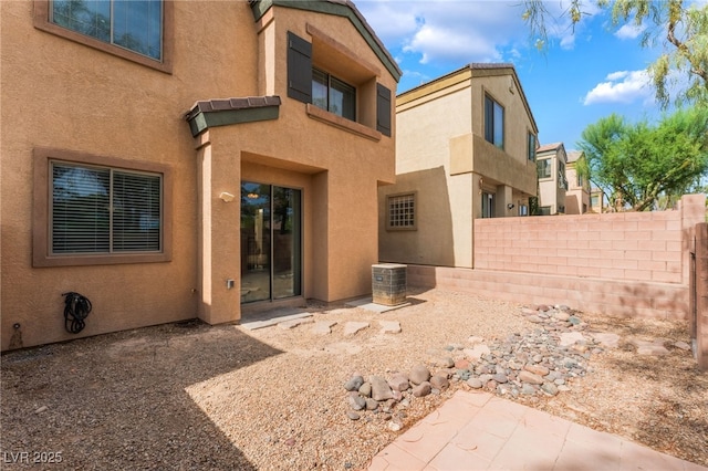 28 Yellow Flame Ave, North Las Vegas, NV 89084 - rear view of house featuring stucco siding