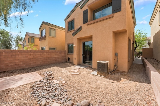 28 Yellow Flame Ave, North Las Vegas, NV 89084 - back of property featuring stucco siding and central AC unit