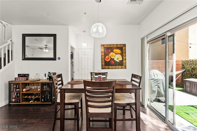 9613 Eland Ct, Las Vegas, NV 89149 - dining space with wood finished floors, healthy amount of natural light, a ceiling fan, and stairway