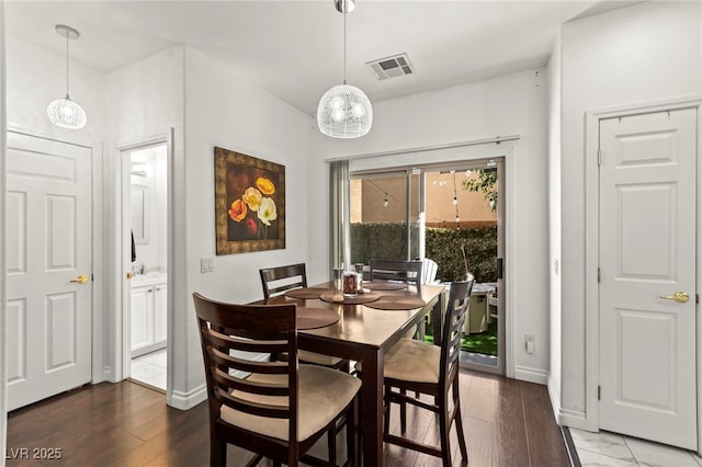 9613 Eland Ct, Las Vegas, NV 89149 - dining area with baseboards and wood finished floors