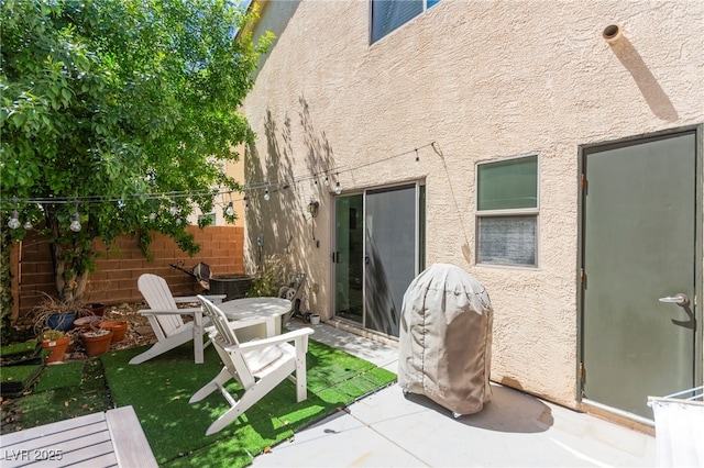 9613 Eland Ct, Las Vegas, NV 89149 - back of house with stucco siding and a patio area