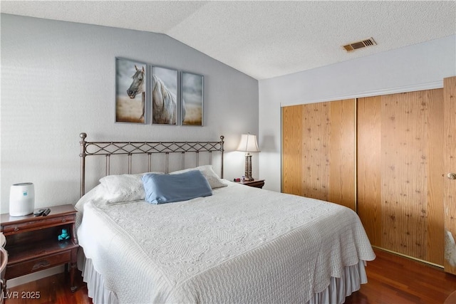 3008 Soledad Dr, Laughlin, NV 89029 - bedroom with wood finished floors, vaulted ceiling, and a closet