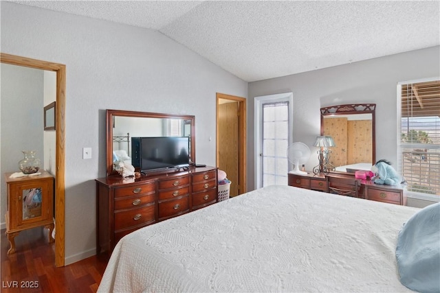 3008 Soledad Dr, Laughlin, NV 89029 - bedroom featuring lofted ceiling, wood finished floors, a textured ceiling, and baseboards