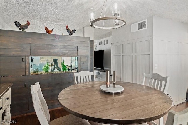 3008 Soledad Dr, Laughlin, NV 89029 - dining area with wood finished floors and a textured ceiling