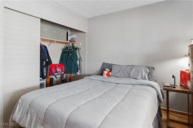3008 Soledad Dr, Laughlin, NV 89029 - bedroom with a closet and wood finished floors