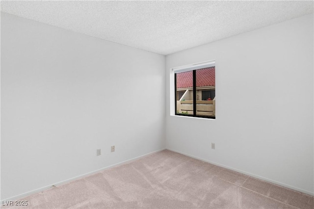 3740 Desert Marina Dr Unit 2, Laughlin, NV 89029 - carpeted empty room featuring a textured ceiling