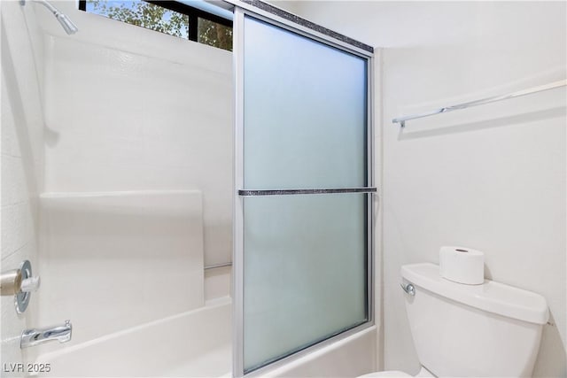 3740 Desert Marina Dr Unit 2, Laughlin, NV 89029 - bathroom featuring bath / shower combo with glass door and toilet