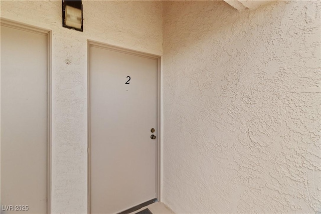 3740 Desert Marina Dr Unit 2, Laughlin, NV 89029 - doorway to property featuring stucco siding