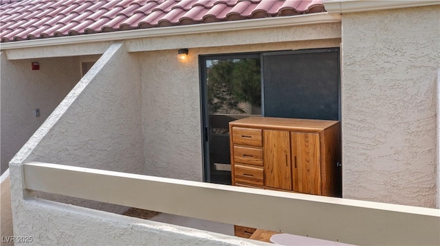 3740 Desert Marina Dr Unit 2, Laughlin, NV 89029 - view of exterior entry featuring stucco siding and a tiled roof