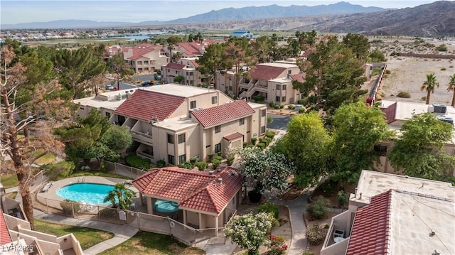 3740 Desert Marina Dr Unit 2, Laughlin, NV 89029 - aerial perspective of suburban area featuring a mountain backdrop and a pool area