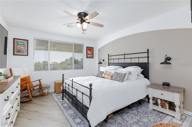 9112 Vista Greens Way Unit 204, Las Vegas, NV 89134 - bedroom featuring light wood finished floors and ceiling fan