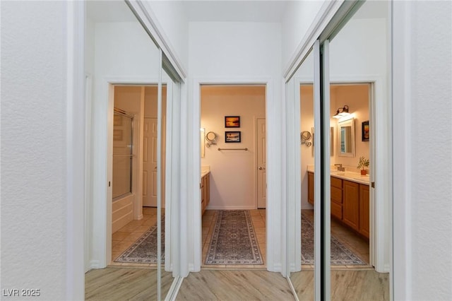 9112 Vista Greens Way Unit 204, Las Vegas, NV 89134 - hallway with light wood finished floors