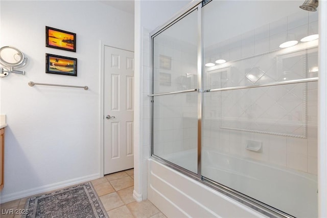 9112 Vista Greens Way Unit 204, Las Vegas, NV 89134 - full bathroom featuring shower / bath combination with glass door, vanity, tile patterned flooring, and baseboards