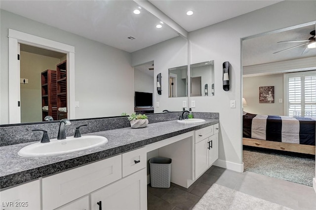 450 Intrepid Ct, Boulder City, NV 89005 - ensuite bathroom with double vanity, recessed lighting, ceiling fan, and baseboards