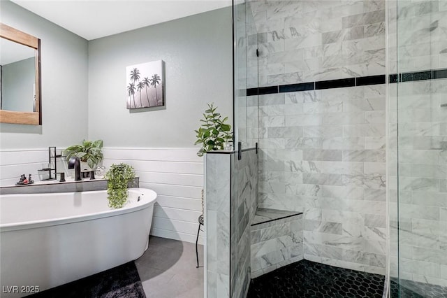 450 Intrepid Ct, Boulder City, NV 89005 - full bathroom with a shower stall, a soaking tub, tile patterned flooring, and a wainscoted wall