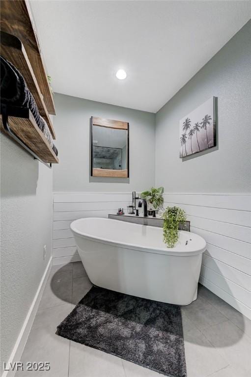 450 Intrepid Ct, Boulder City, NV 89005 - bathroom featuring a freestanding tub, tile patterned flooring, and recessed lighting
