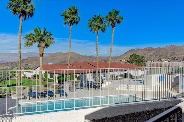 450 Intrepid Ct, Boulder City, NV 89005 - community pool featuring a mountain view and a patio area