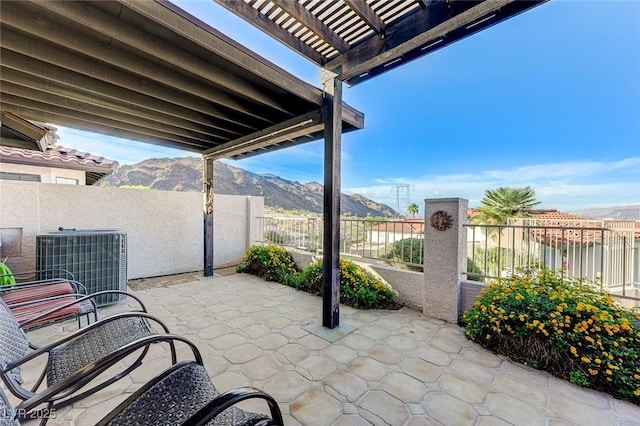 450 Intrepid Ct, Boulder City, NV 89005 - view of patio with cooling unit, a mountain view, and a pergola