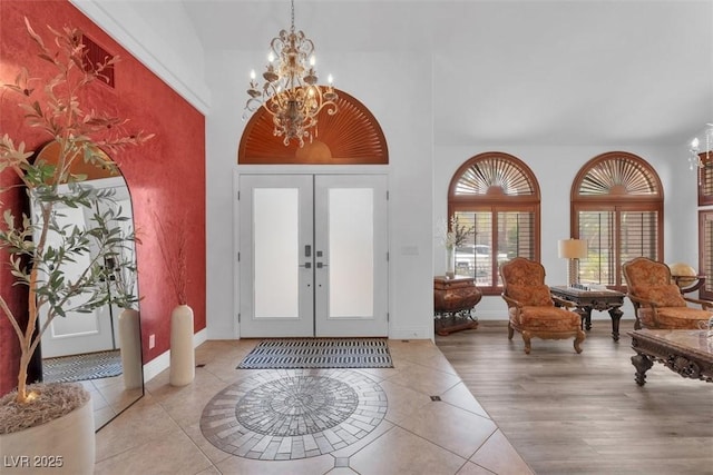 4108 Royal Scots Ave, Las Vegas, NV 89141 - tiled entrance foyer with a chandelier, french doors, and baseboards
