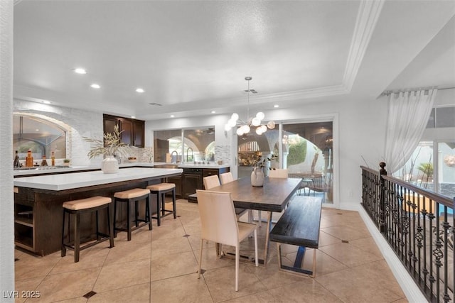 4108 Royal Scots Ave, Las Vegas, NV 89141 - dining room featuring a chandelier, plenty of natural light, light tile patterned flooring, recessed lighting, and a raised ceiling
