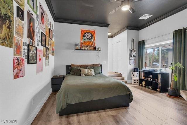4108 Royal Scots Ave, Las Vegas, NV 89141 - bedroom with ornamental molding, wood finished floors, baseboards, and a ceiling fan