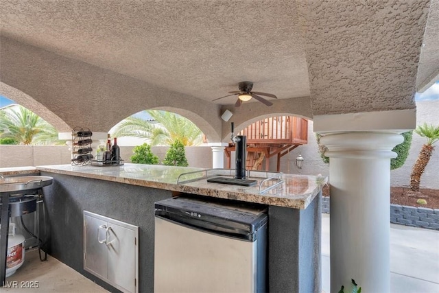 4108 Royal Scots Ave, Las Vegas, NV 89141 - view of patio / terrace with a ceiling fan and exterior kitchen