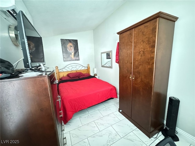 1505 Lilac Breeze Cir, Las Vegas, NV 89108 - bedroom with light marble finish flooring and lofted ceiling